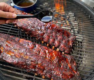 pork ribs on a charcoal grill